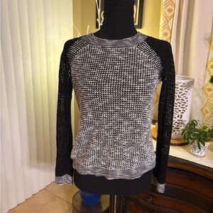 Super cute knitted black & white sweater.